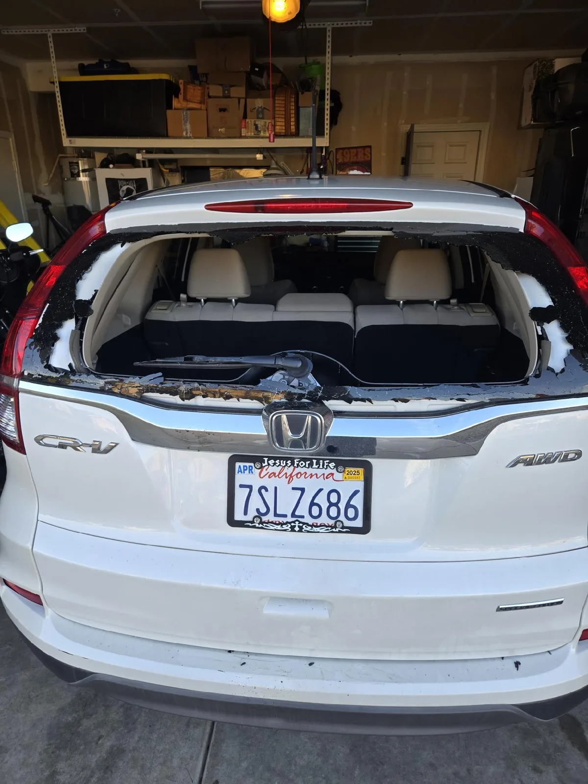 Shattered rear window on a Honda CR-V before back window replacement by Very Smooth Auto Glass in Lincoln, CA