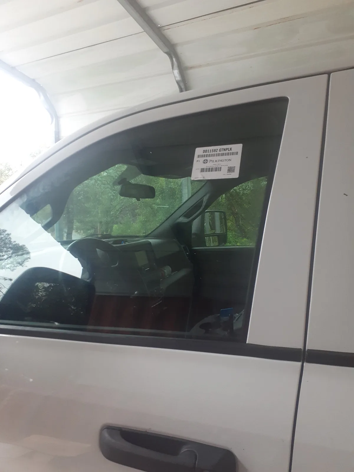 New Pilkington door glass installed by Very Smooth Auto Glass after mobile side window replacement in Lincoln, CA