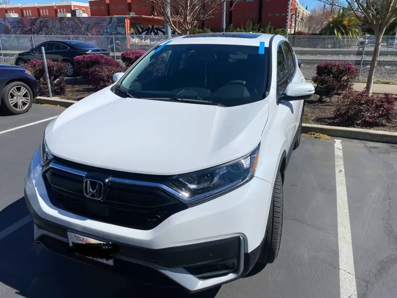 Honda CR-V with fresh windshield install and blue tape in Newcastle, CA