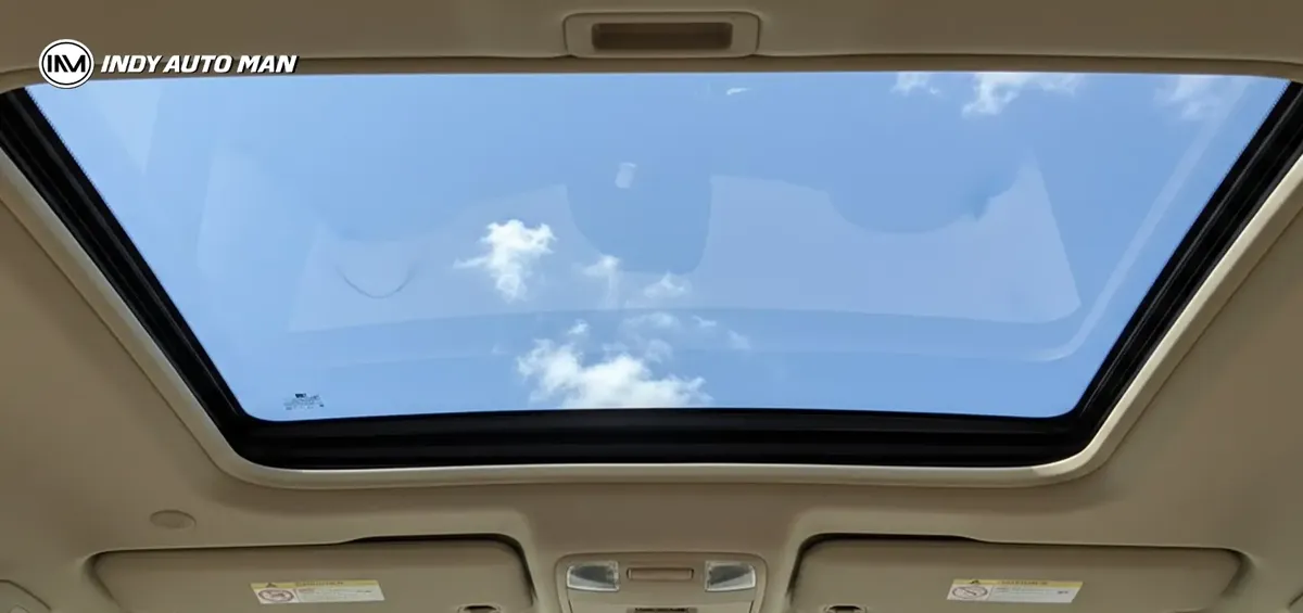 Sunroof glass interior view looking up at sky through sealed sunroof