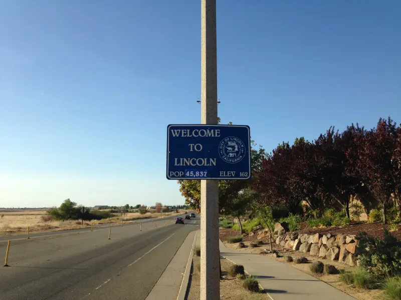 Welcome to Lincoln, California road sign. Pop. 45,837, Elev. 162.